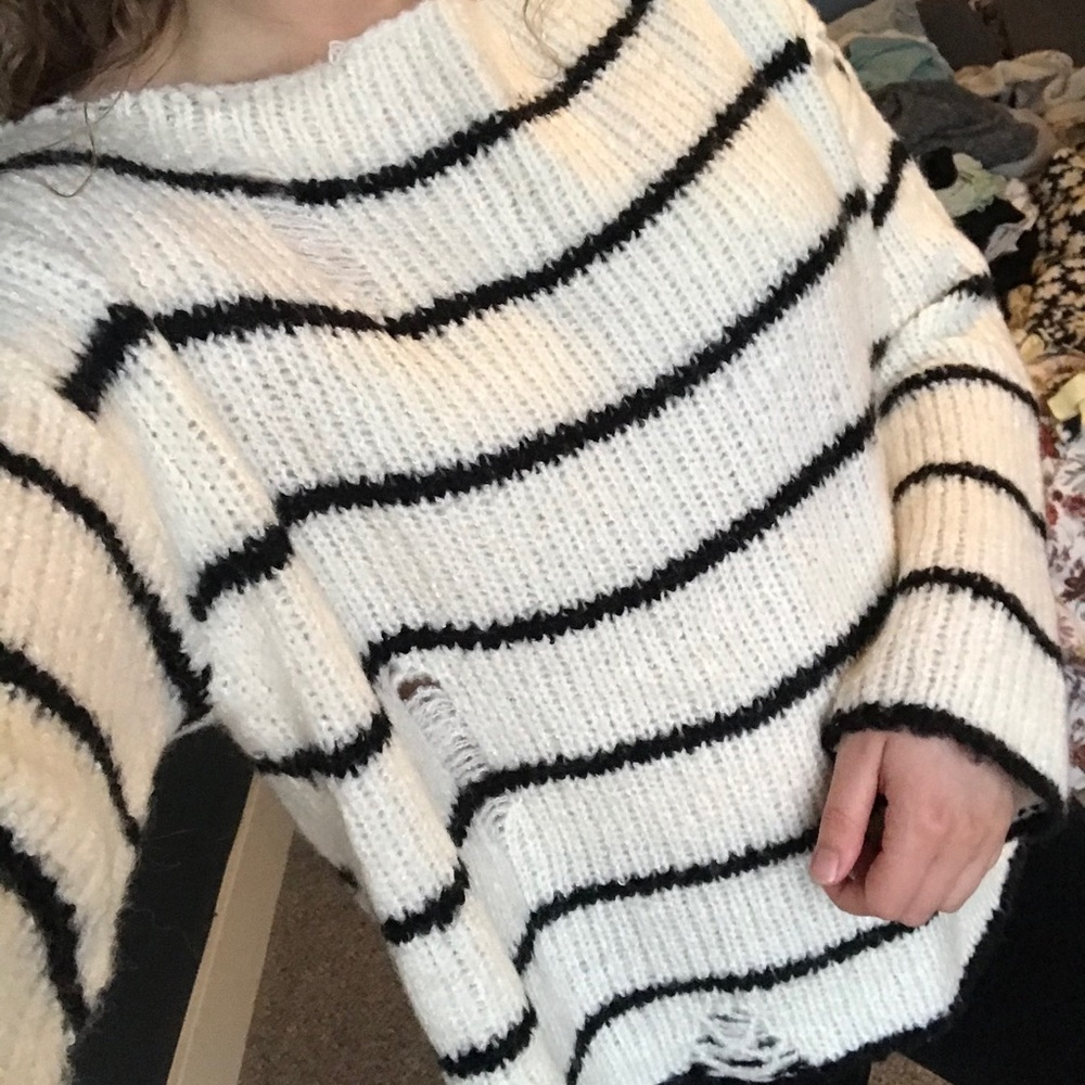 Beautiful ripped white and black sweater
